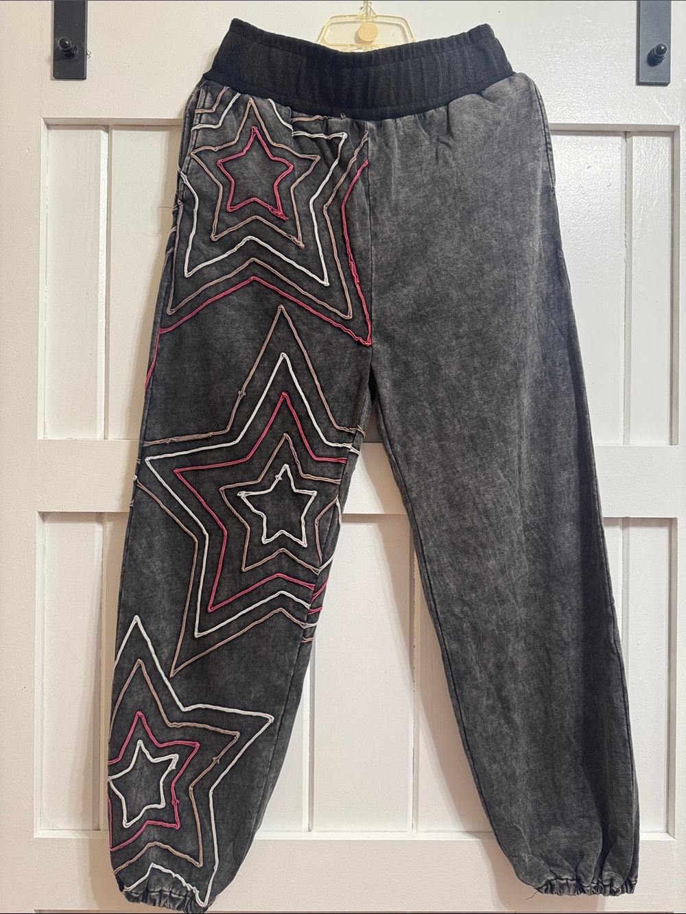 Oli & Hali Black Acid-Wash Joggers with Pink and White Star Stitching